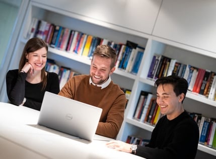 Smiling people testing out the customer experience
