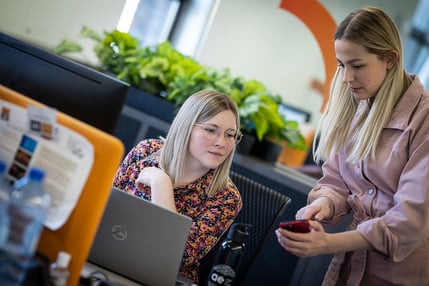 People testing out the customer experience on a smart device