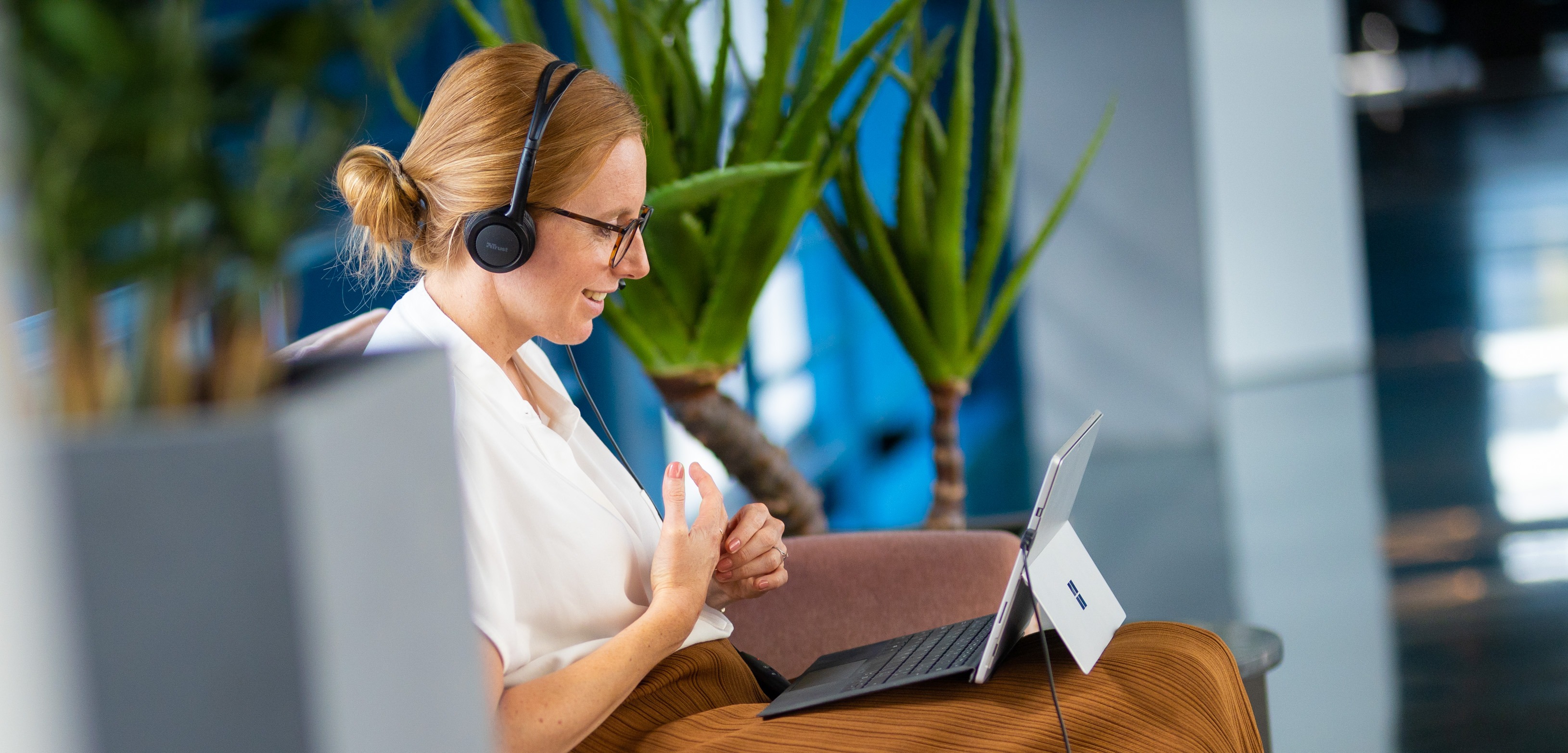 Female consultant having a digital call